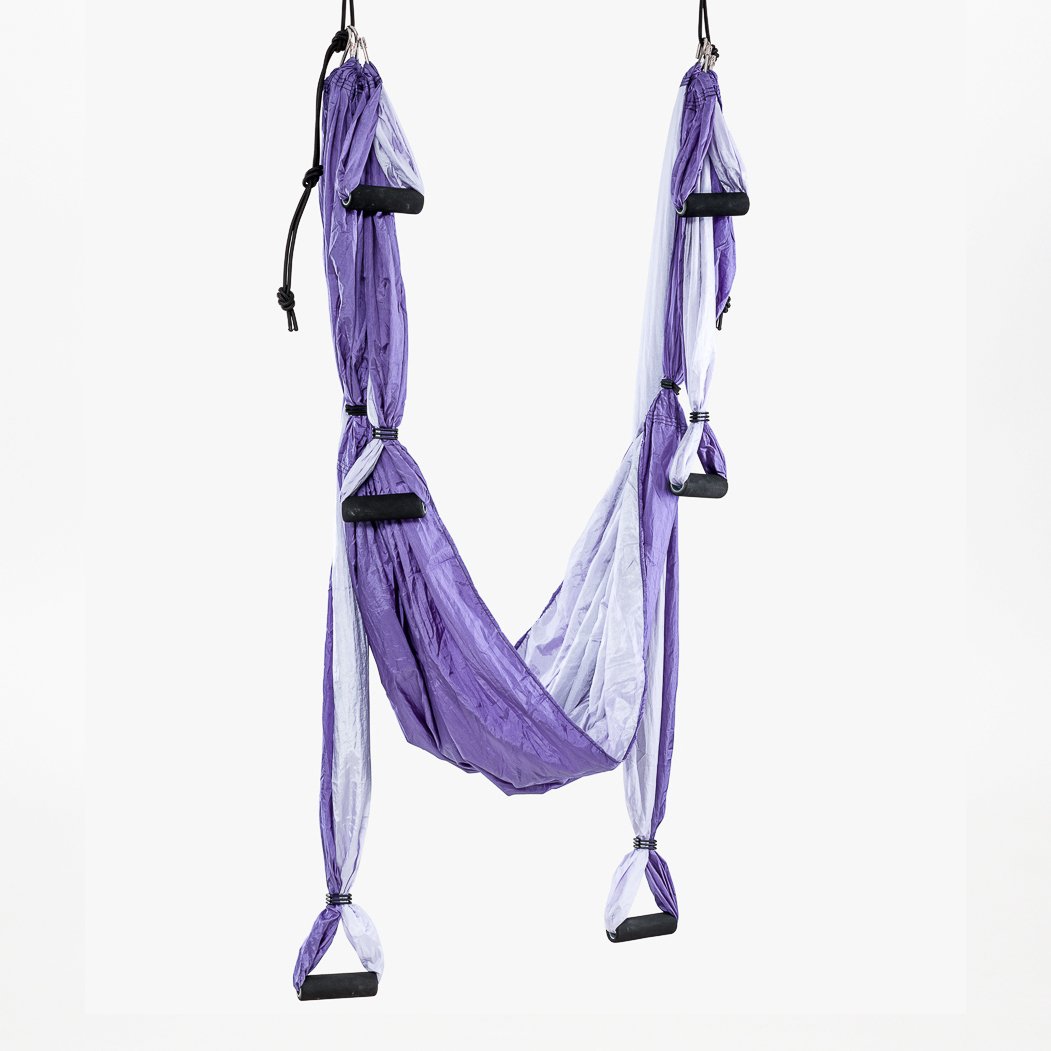 A purple aerial yoga swing, suspended - Tribe | Eco yoga Store