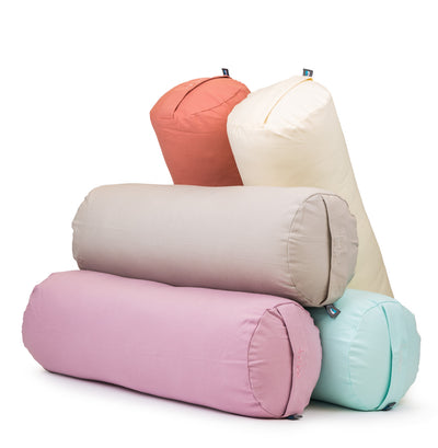 TRIBE Round Bolsters - Organic Cotton Cover - group shot of pastel shades | Eco Yoga Store