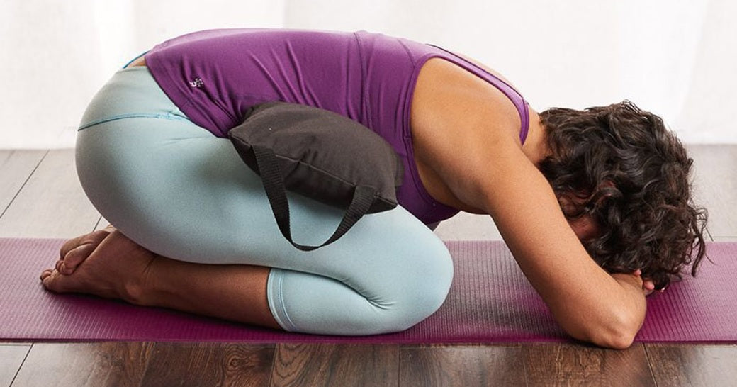 Yoga sandbag & blanket in use - Tribe | Eco Yoga Store