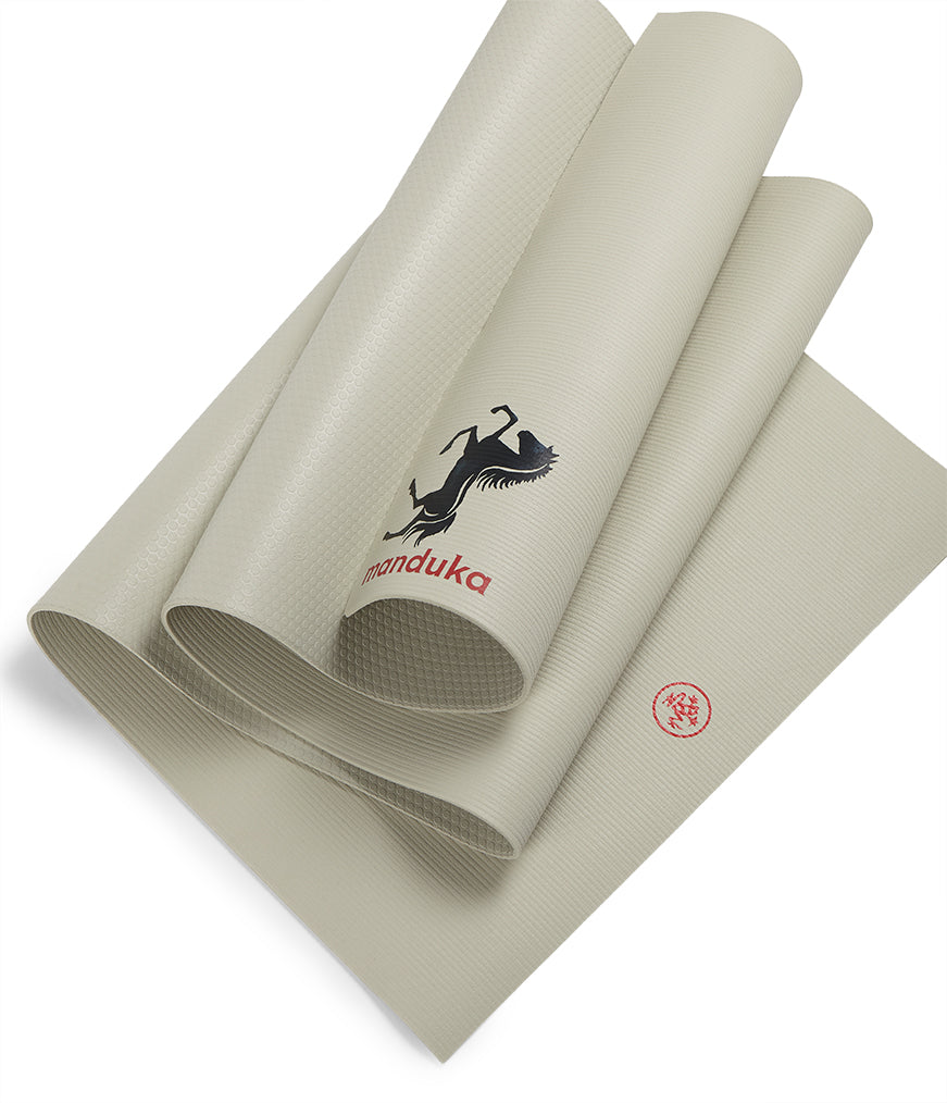 Manduka PROLite 5mm - Fire Horse - folded with both logos visible | Eco Yoga Store