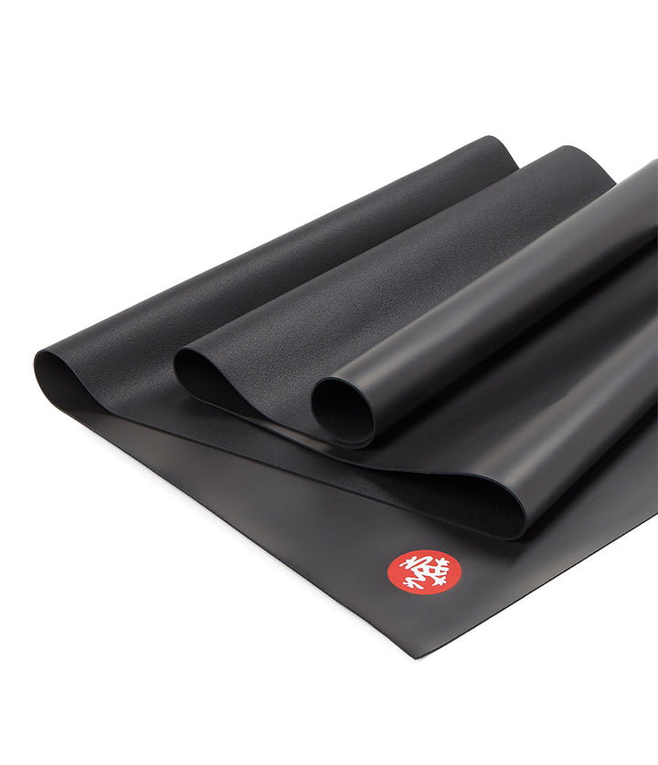 Manduka GRP Adapt Travel 1.5mm Yoga Mat - Carbon Black - part folded | Eco Yoga Store