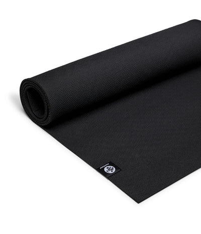 Manduka X 5mm Yoga Mat - Black - Semi unfurled | Eco Yoga Store