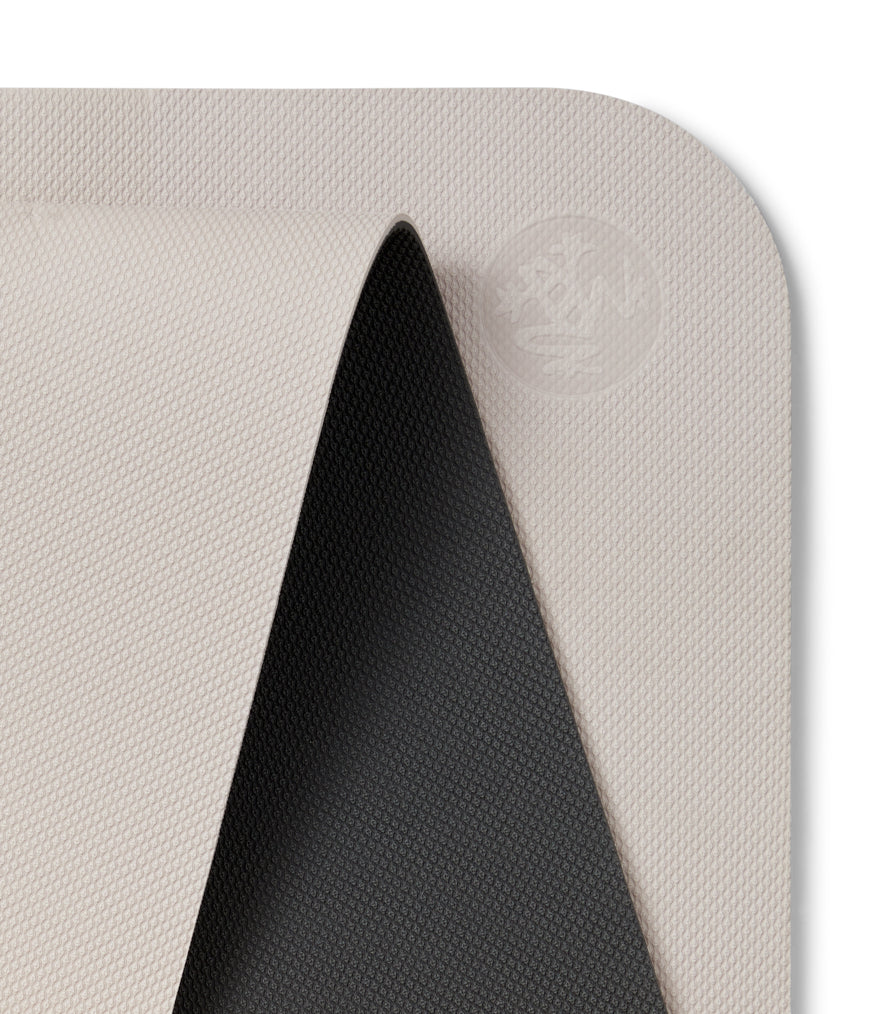 Manduka Begin Mat 5mm Yoga Mat - Crystal Thunder - top corner loosely rolled showing both sides | Eco Yoga Store