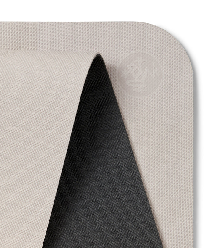 Manduka Begin Mat 5mm Yoga Mat - Crystal Thunder - top corner loosely rolled showing both sides | Eco Yoga Store
