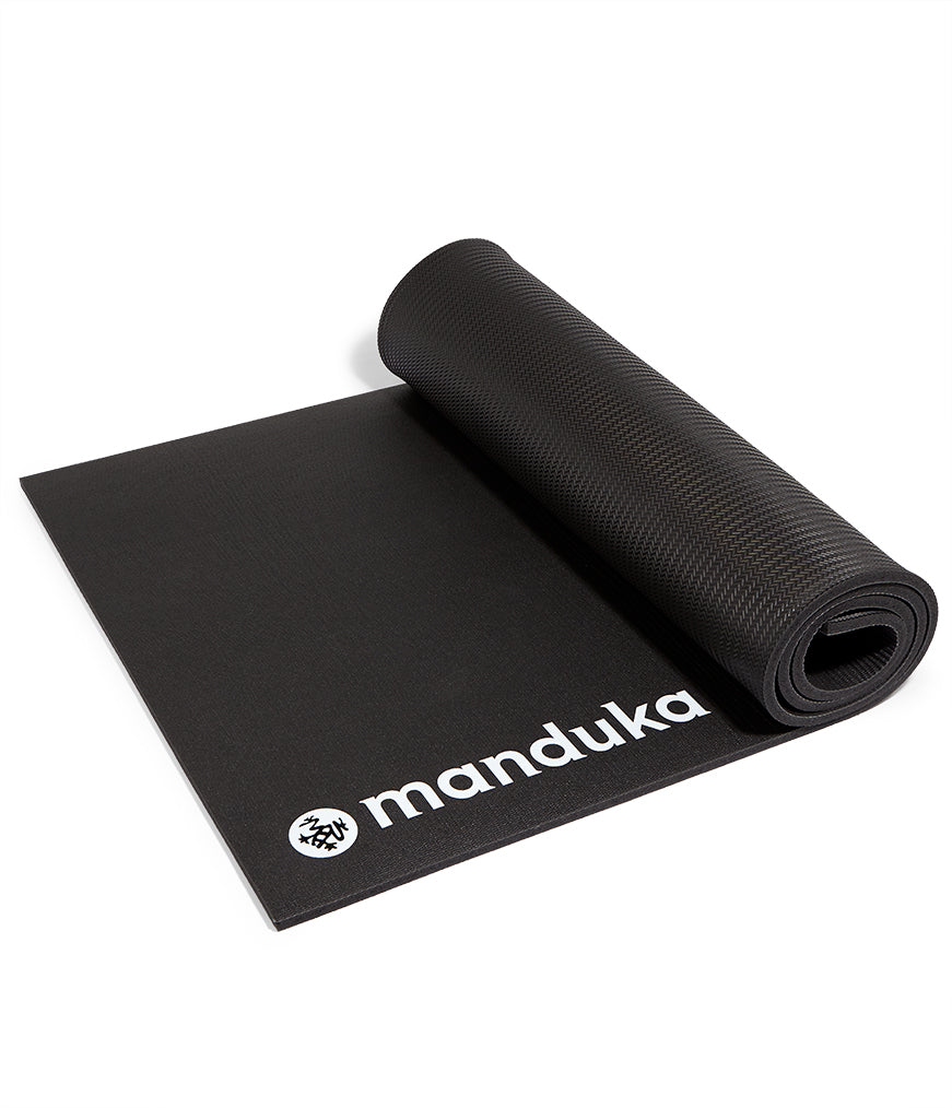 Manduka ENDURA Fitness Mat 10mm - Black - part rolled side on | Eco Yoga Store