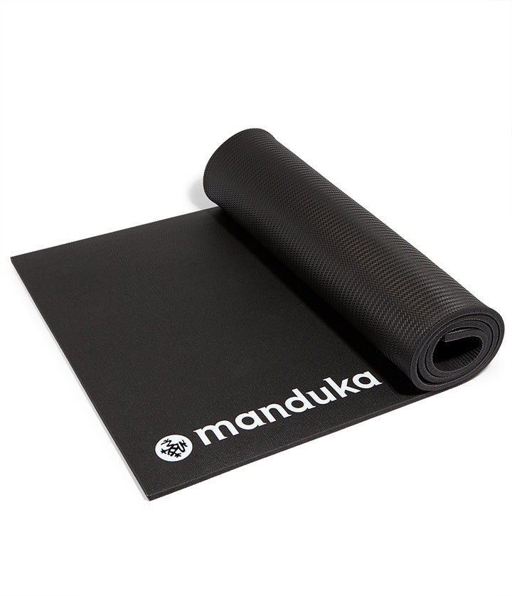 Manduka ENDURA Fitness Mat 10mm - Black - part rolled side on | Eco Yoga Store