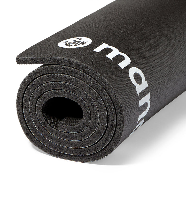 Manduka ENDURA Fitness Mat 10mm - Black - rolled | Eco Yoga Store