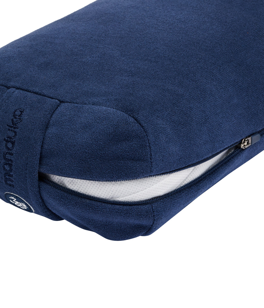 Manduka Enlight Lean Bolster - Midnight - exposed filling | Eco Yoga Store