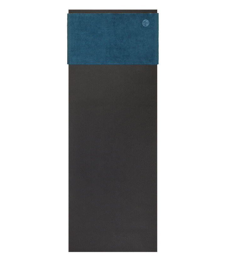 Manduka eQua Hand Towel - Maldive - placed on a yoga mat | Eco Yoga Store