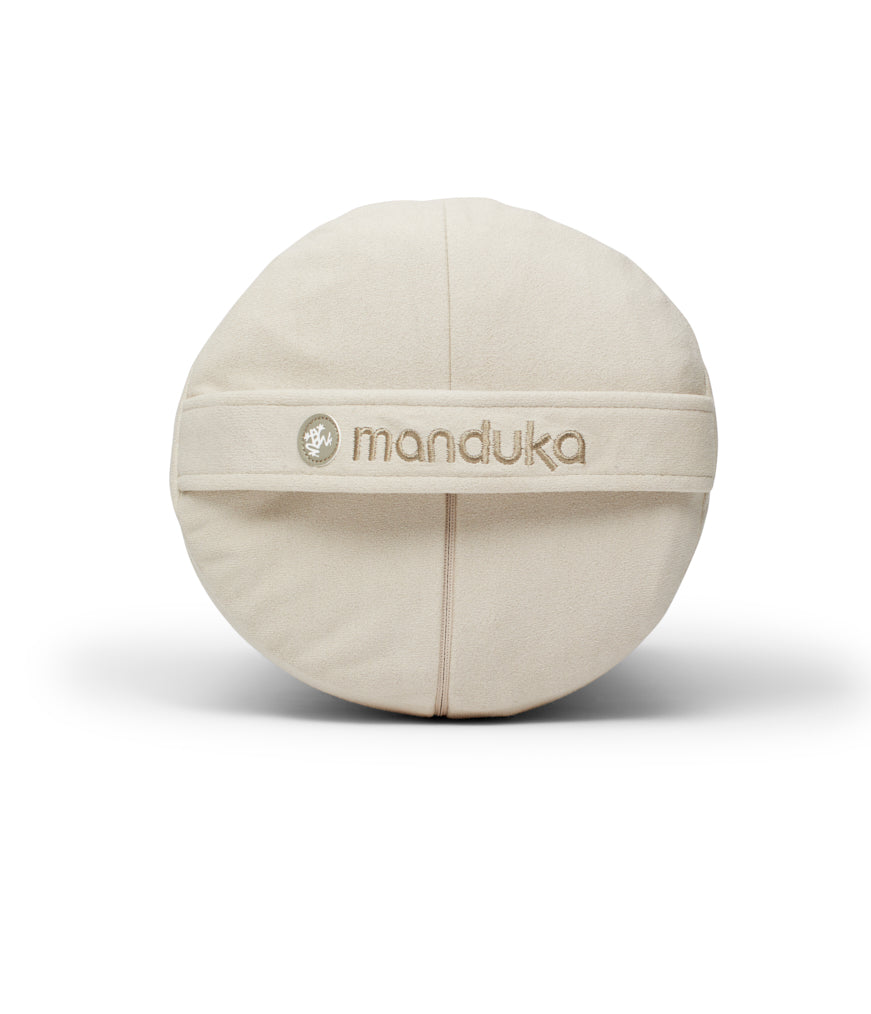 Manduka Enlight Round Bolster - Sand - side on + handle | Eco Yoga Store