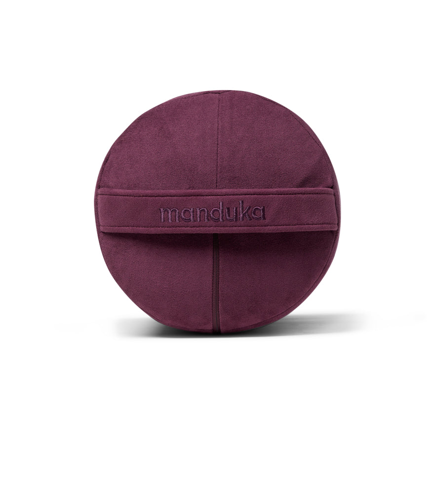 Manduka Enlight Round Bolster - Indulge - side on + handle | Eco Yoga Store
