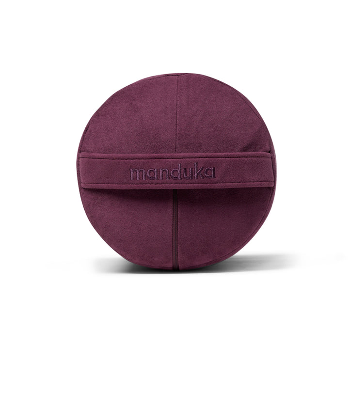 Manduka Enlight Round Bolster - Indulge - side on + handle | Eco Yoga Store