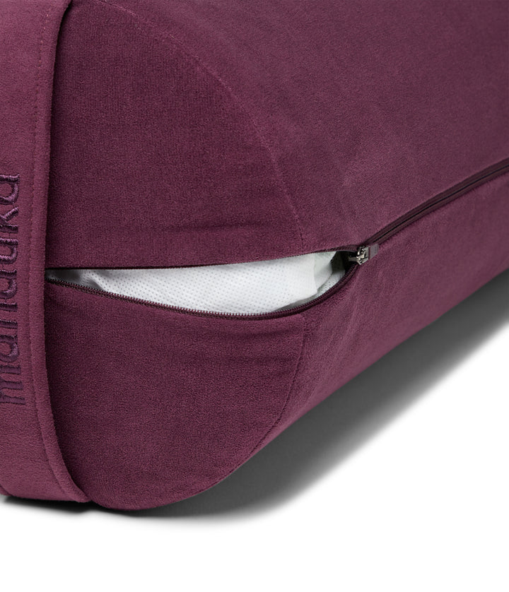 Manduka Enlight Round Bolster - Indulge - exposed filling | Eco Yoga Store
