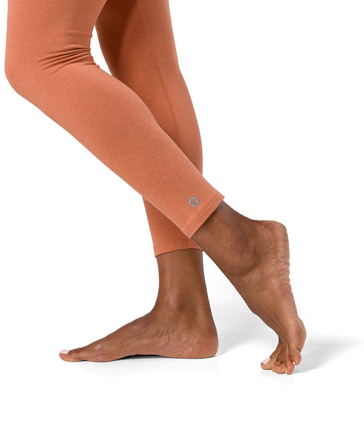 Dhara Legging - Clay Heather - Ankle View - Gallery Image 1 | Manduka | Eco Yoga Store