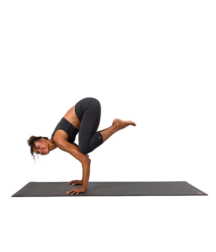 Dhara Capri Legging - Phantom - model in asana on PRO Yoga Mat - Gallery Image 7 | Manduka | Eco Yoga Store