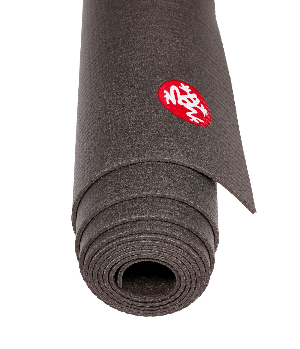 Manduka PRO Travel 2.5mm Yoga Mat - Black - rolled end on | Eco Yoga Store