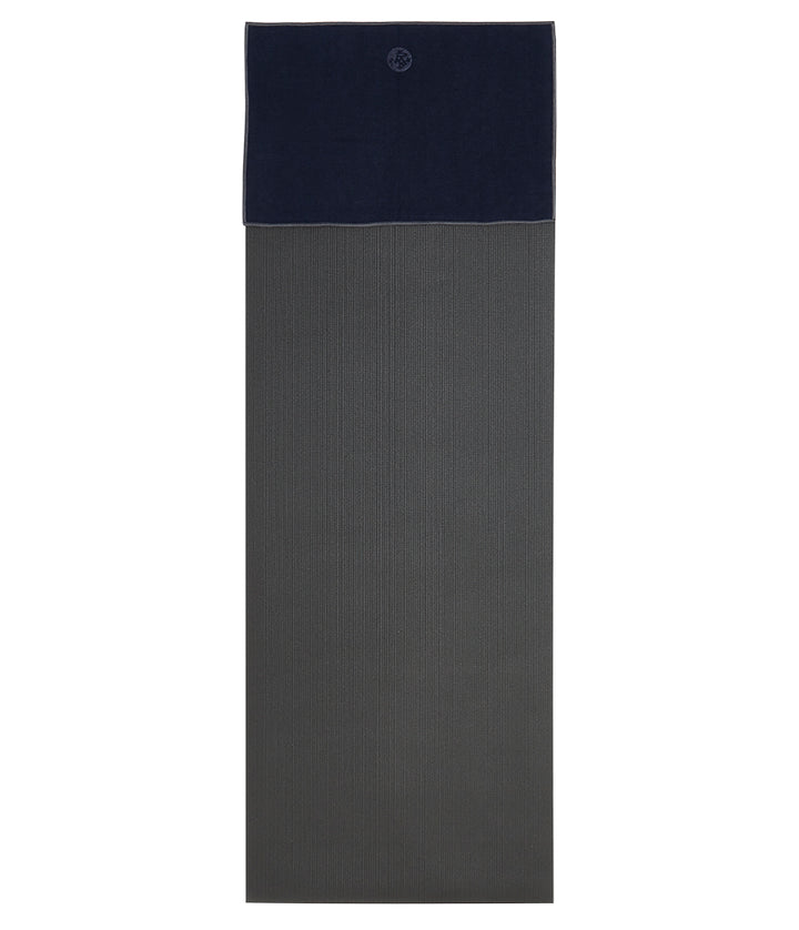 Manduka Yogitoes Hand Towel - Midnight - lying flat on top of a yoga mat | Eco Yoga Store