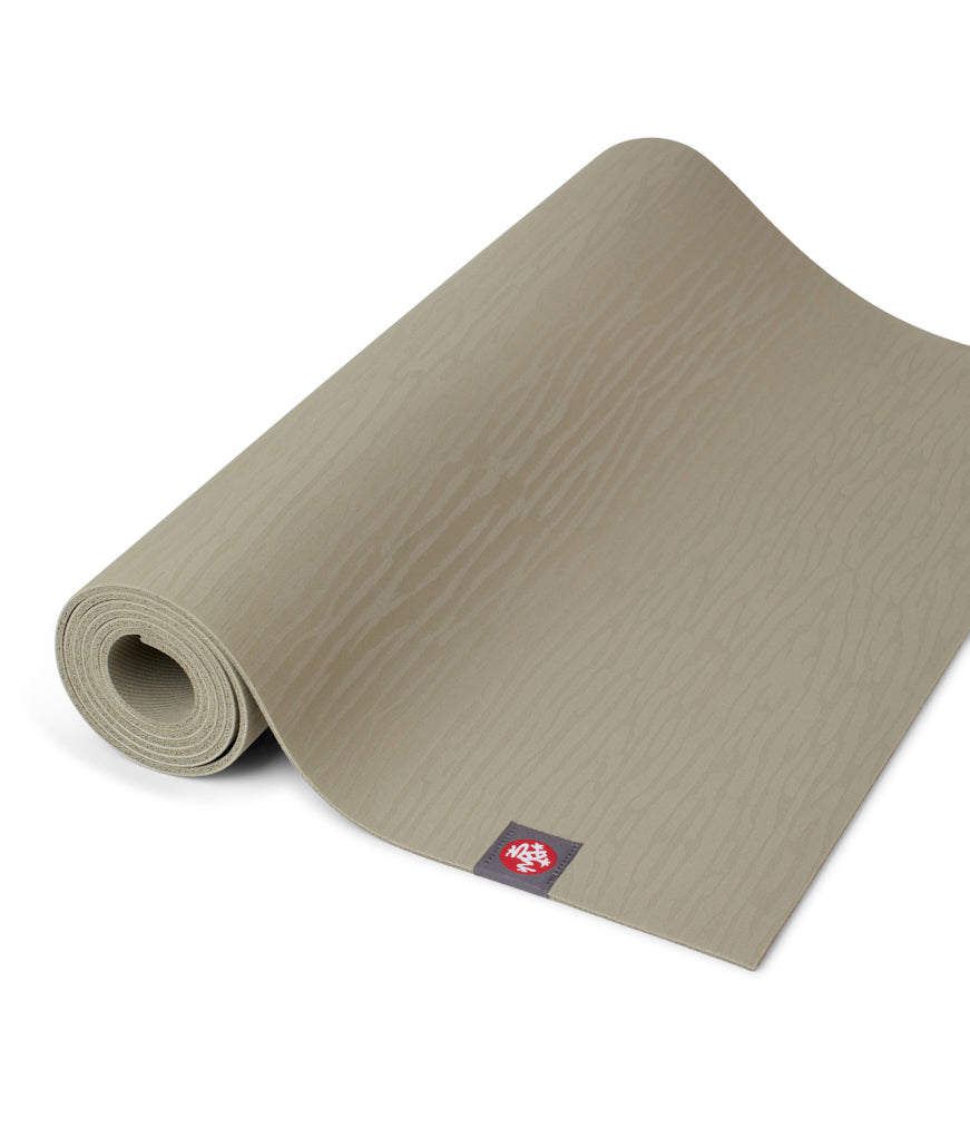 Manduka eKOLite 4mm Yoga Mat - Rock - part rolled | Eco Yoga Store