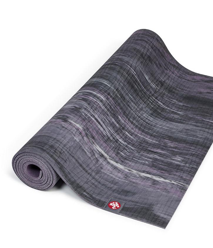 Manduka eKOLite 4mm Yoga Mat - Black Amethyst Marbled - part rolled | Eco Yoga Store