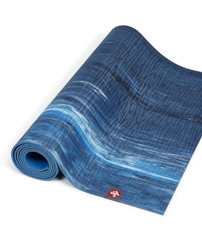 Manduka eKOLite 4mm Yoga Mat - Dark Sapphire Marbled - part rolled | Eco Yoga Store