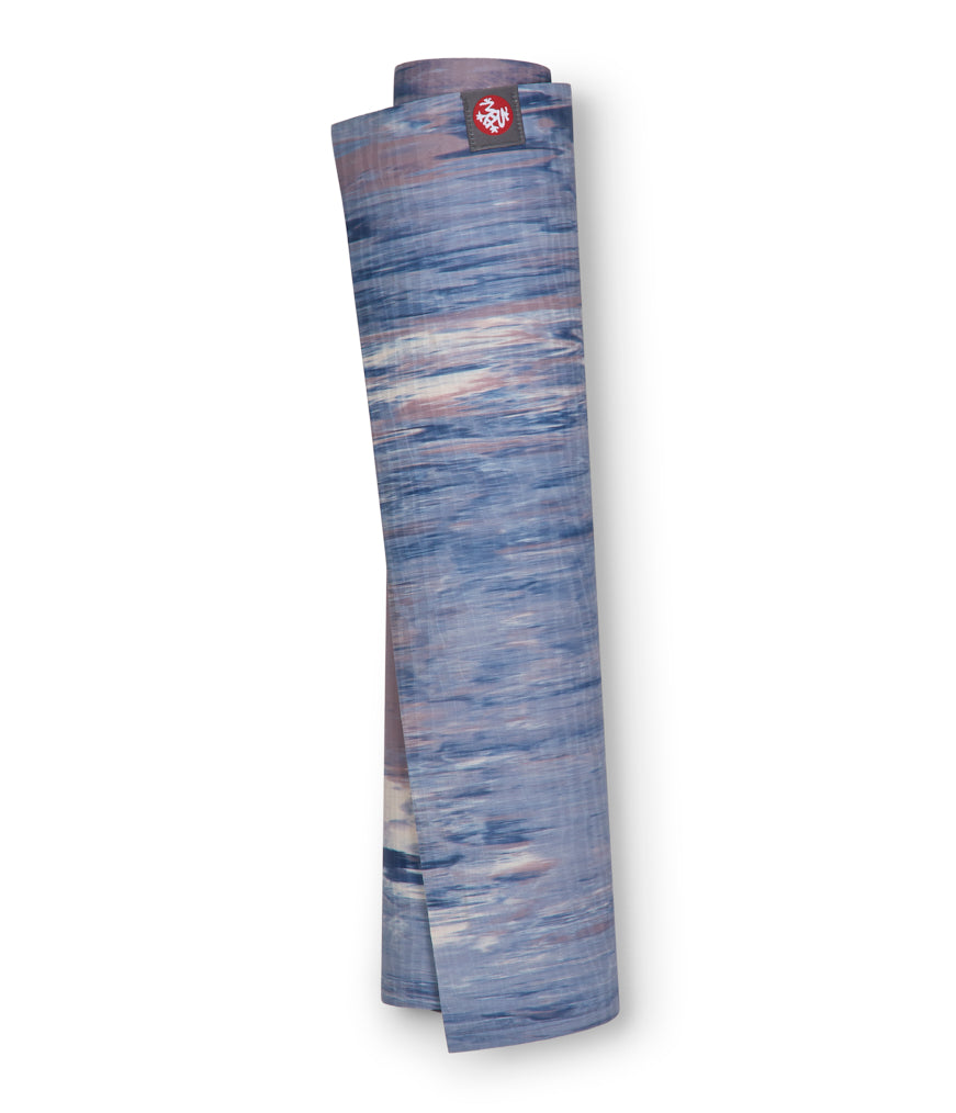 Manduka eKOLite 4mm Yoga Mat - Odyssey Marbled - rolled vertical | Eco Yoga Store