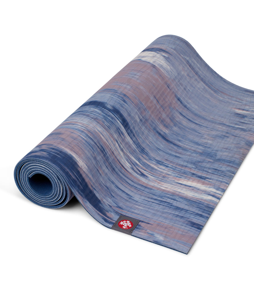 Manduka eKOLite 4mm Yoga Mat - Odyssey Marbled - part rolled | Eco Yoga Store