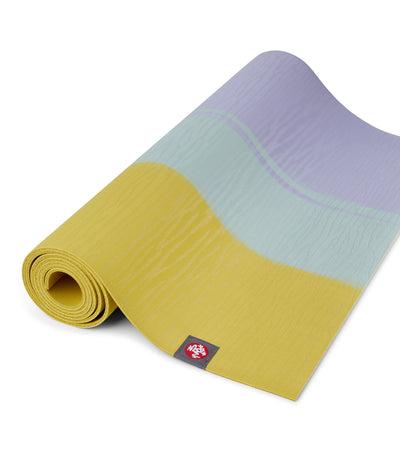 Manduka eKOLite 4mm Yoga Mat - Bamboo Stripe - part rolled | Eco Yoga Store