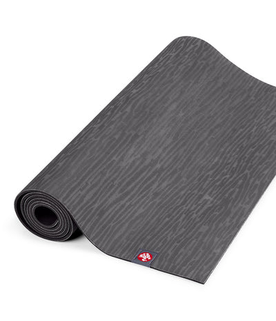 Manduka eKO 5mm Long Yoga Mat - Charcoal - part rolled | Eco Yoga Store