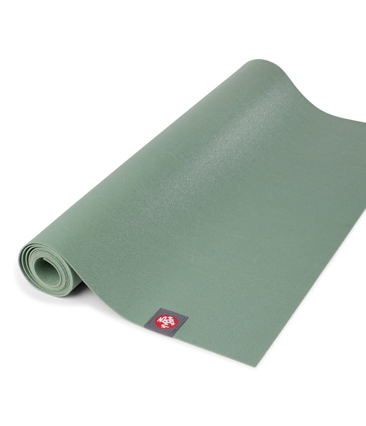 Manduka eKO Superlite 1.5mm Yoga Mat - Leaf Green - part rolled | Eco Yoga Store