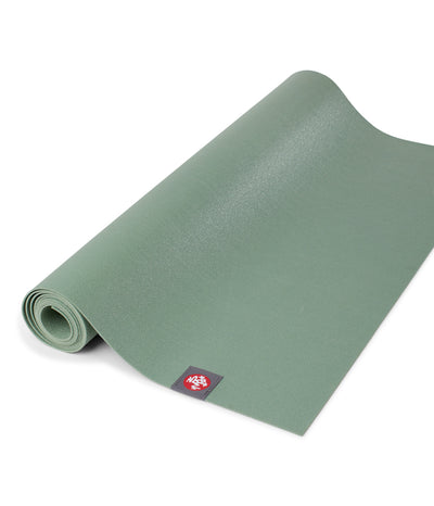 Manduka eKO Superlite 1.5mm Yoga Mat - Leaf Green - part rolled | Eco Yoga Store