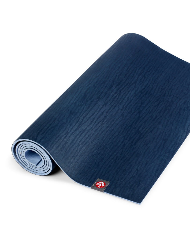 Manduka eKO 5mm Long Yoga Mat - Midnight - part rolled | Eco Yoga Store