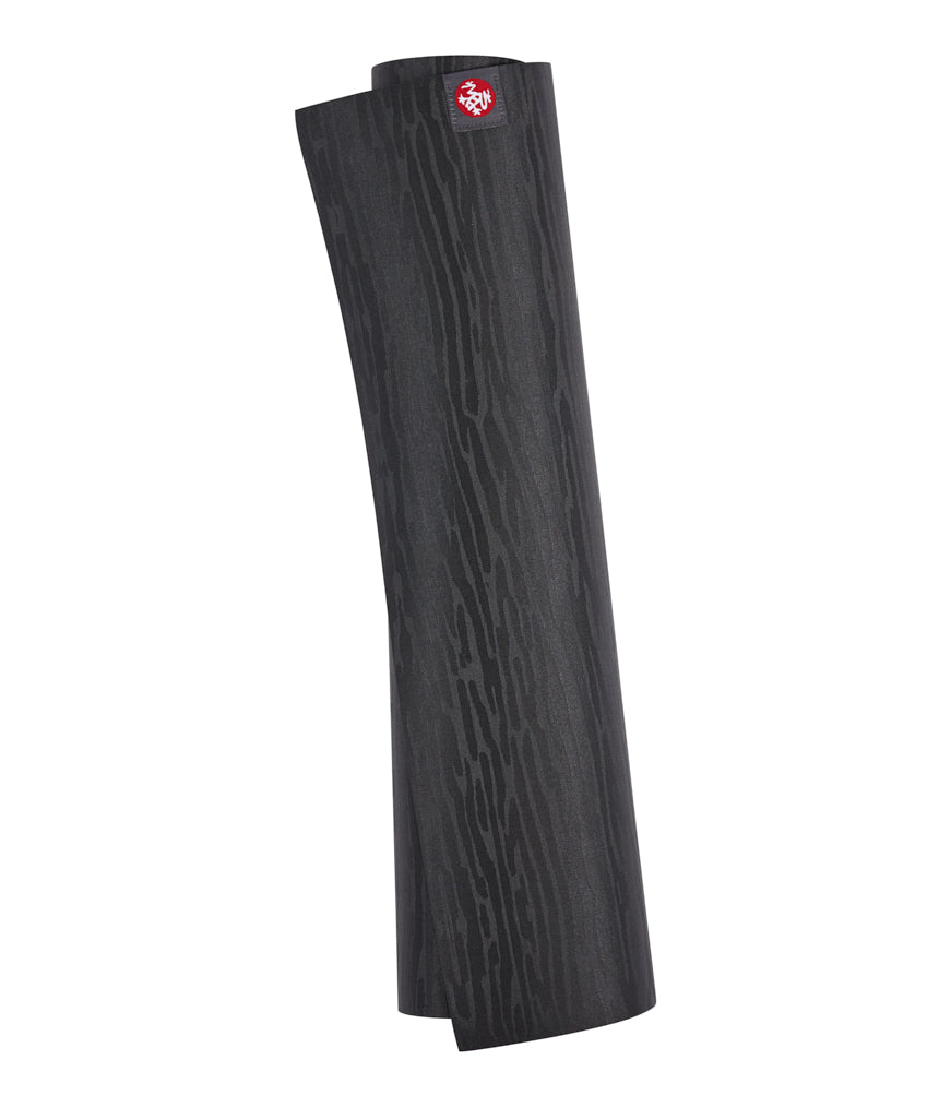 Manduka eKOLite 4mm Long Yoga Mat - Charcoal - rolled vertical | Eco Yoga Store