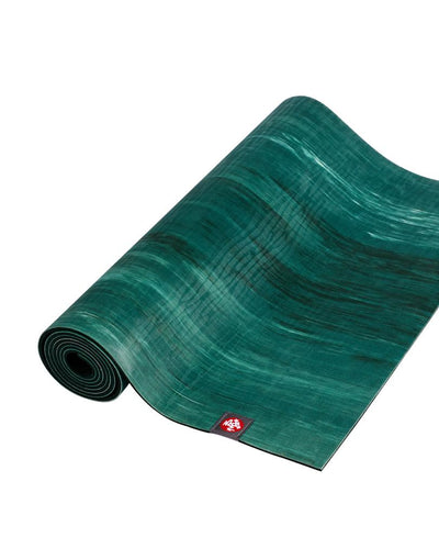 Manduka eKOLite 4mm Yoga Mat - Deep Forest Marbled - part rolled | Eco Yoga Store