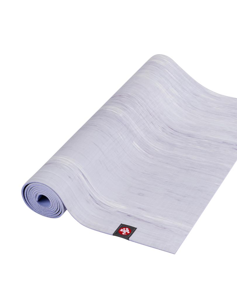 Manduka eKOLite 4mm Yoga Mat - Cosmic Sky Marbled - part rolled | Eco Yoga Store