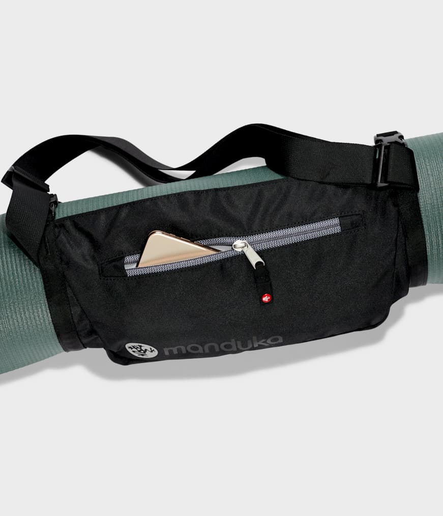 Manduka Go Play 3.0 Mat Carrier - Black - around mat with mobile phone in accesory pocket | Eco Yoga Store