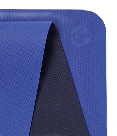 Manduka Begin Mat 5mm Yoga Mat - Surf - top corner loosely rolled showing both sides | Eco Yoga Store