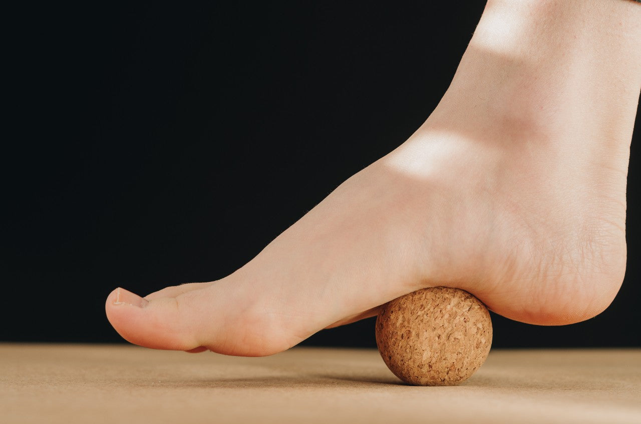 TRIBE Cork Massage Ball - under the arch of right foot | Eco Yoga Store