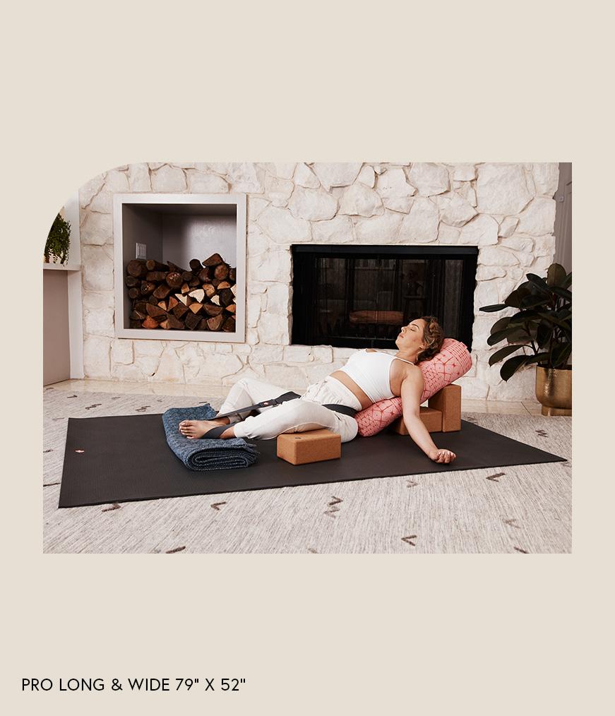 Manduka PRO 6mm Extra Large - Long & Wide - Black - yogi with blocks, bolsters, blanket on yoga mat in living room | Eco Yoga Store