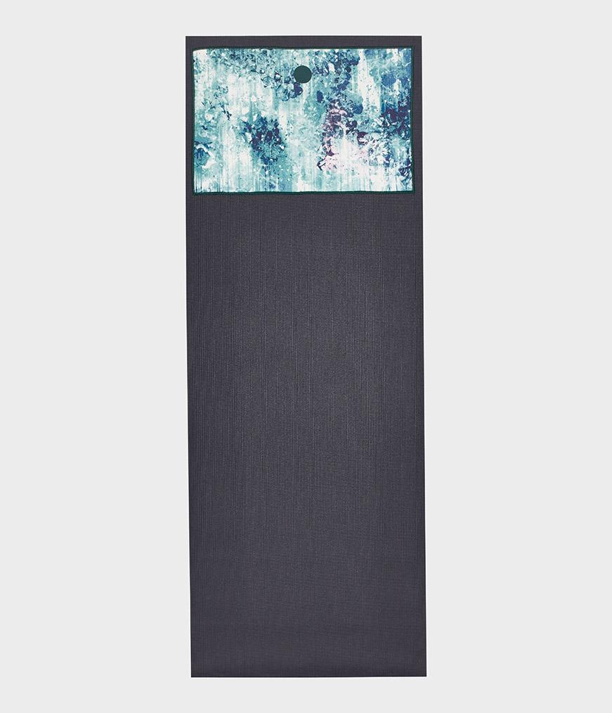Manduka Yogitoes Hand Towel - Undercurrent Flora - lying flat on top of a yoga mat | Eco Yoga Store