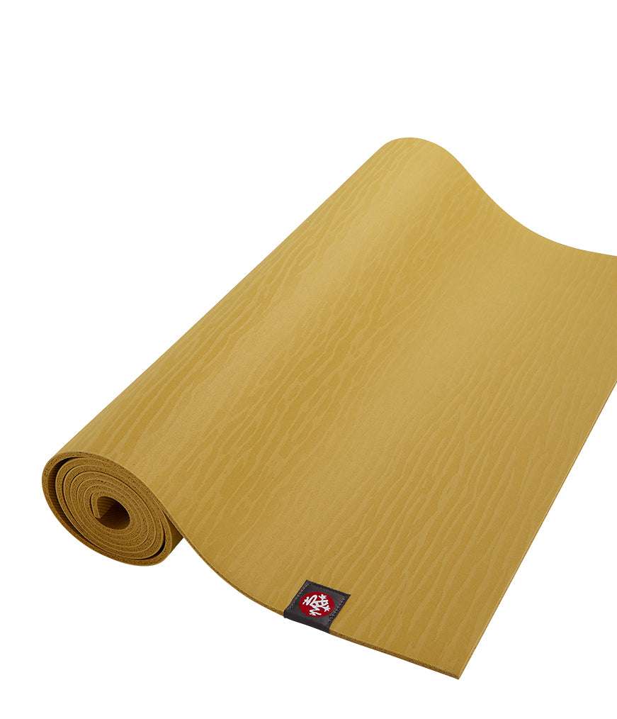 Manduka eKOLite 5mm Yoga Mat - Gold - part rolled | Eco Yoga Store