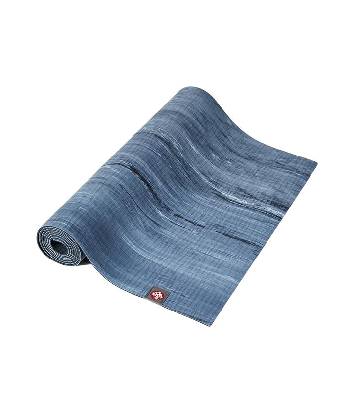 Manduka eKOLite 4mm Yoga Mat - EBB - part rolled | Eco Yoga Store