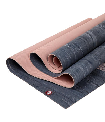 Manduka eKOLite 4mm Yoga Mat - Coral Marbled - folded | Eco Yoga Store