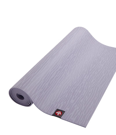 Manduka eKOLite 4mm Yoga Mat - Lavender - part rolled | Eco Yoga Store