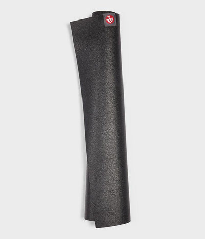 Manduka eKO Superlite 1.5mm Yoga Mat - Black - rolled vertical | Eco Yoga Store