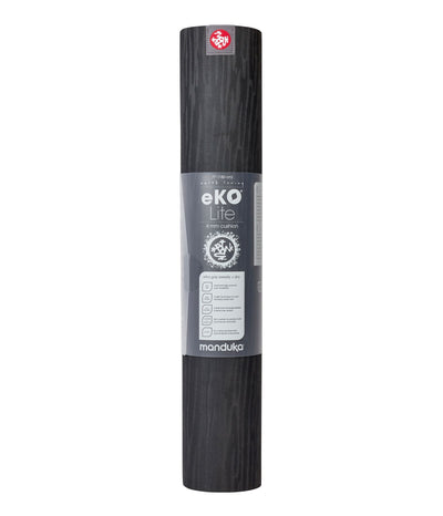 Manduka eKOLite 4mm Yoga Mat - Black - rolled vertical in wrapper | Eco Yoga Store