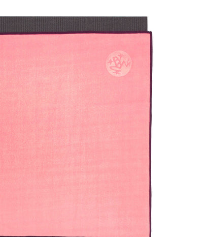 Manduka eQua Mat Towel - Desert Flower - on top of a yoga mat | Eco Yoga Store