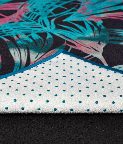 Manduka Yogitoes Mat Towel - Tropics Black - folded over showing underside t | Eco Yoga Store